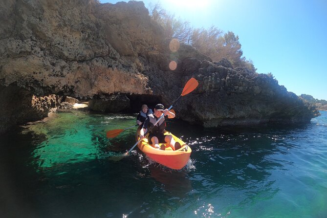 Alcudia: Guided Sea Kayaking & snorkelling Tour (day & sunset) - Stop at La Victòria: the sea-cave and cliff experience