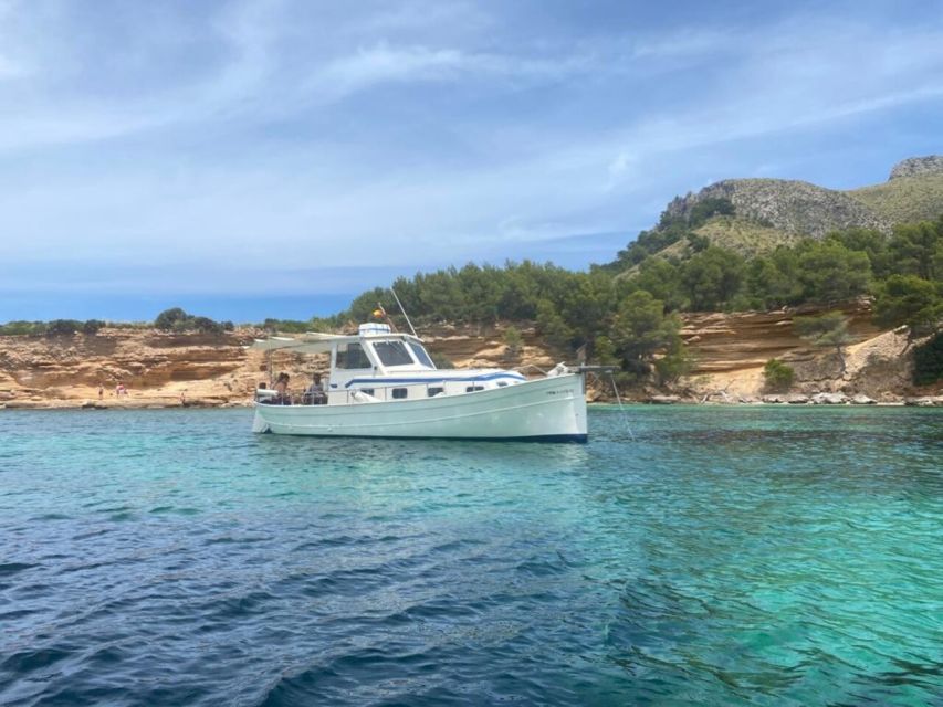 Alcudia: Private Sunset Boat Trip with Glass of Wine & Snack - Key highlights you’ll actually care about