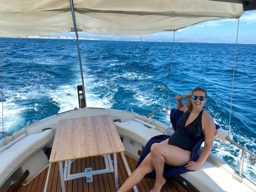 Alcudia: Private Sunset Boat Trip with Glass of Wine & Snack - Why an Alcúdia sunset on a llaüt feels more local than it sounds