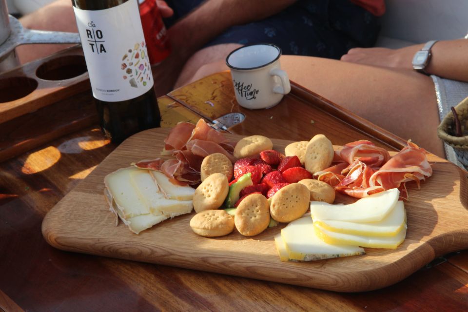 Alcudia: Private Sunset Boat Trip with Glass of Wine & Snack - Who should book this sunset cruise in Alcúdia?
