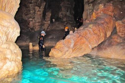 Cala Romantica Water Cave Adventure - Gear up for the aquatic cave: wetsuit, helmet, and optional abseiling