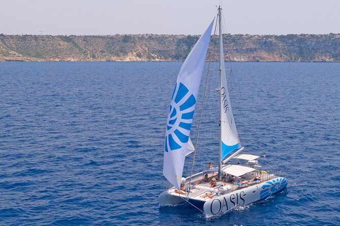 Catamaran sailing in Mallorca through the Bay of Palma with BBQ - A small-group catamaran setup for an easier Mallorca day