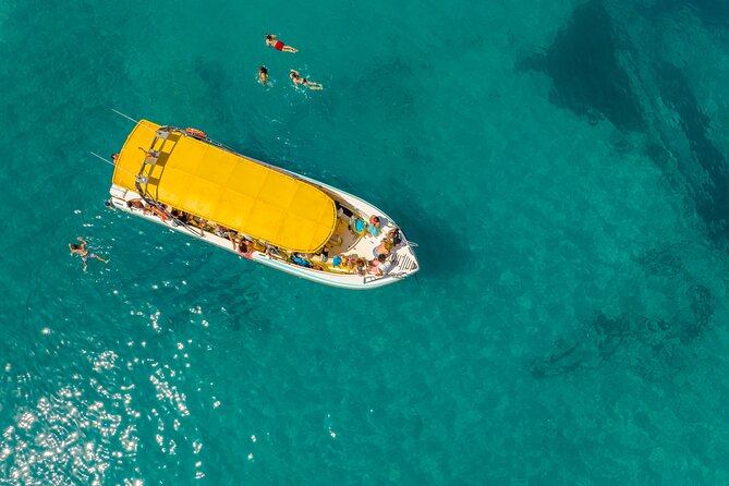 Enjoy crystal clear waters for 2 hours - Getting on board at Cl Moll Comercial del 5