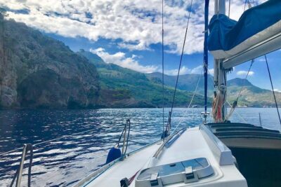 Half Day Sailing Excursion along the Coast with Sunset - Entering Port de Sóller: Meeting at FERGUS Style Soller Beach