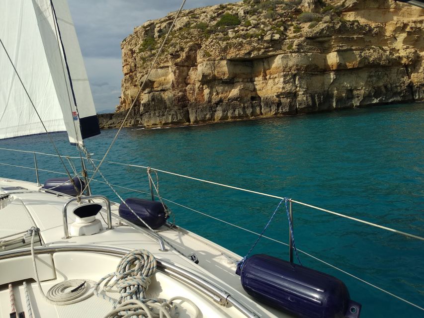 Mallorca: Cala Vella Boat Tour with Swiming, Food, & Drinks - Cala Blava: caves, photos, and a break from straight cruising