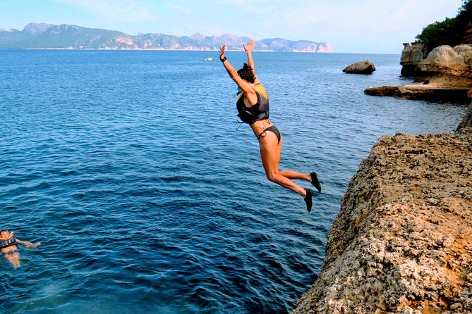 Mallorca: Kayaking, Sea Cave, Cliff Jumping & Snorkel Tour - Secret swimming stop and snorkeling: clear water, short segments, good variety