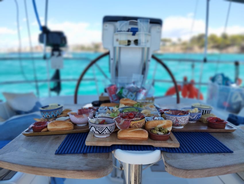 Palma Bay: Sailing Boat Trip w/ Water Toys, Snacks & Drinks - Captain Style, Languages, and the Little Extras