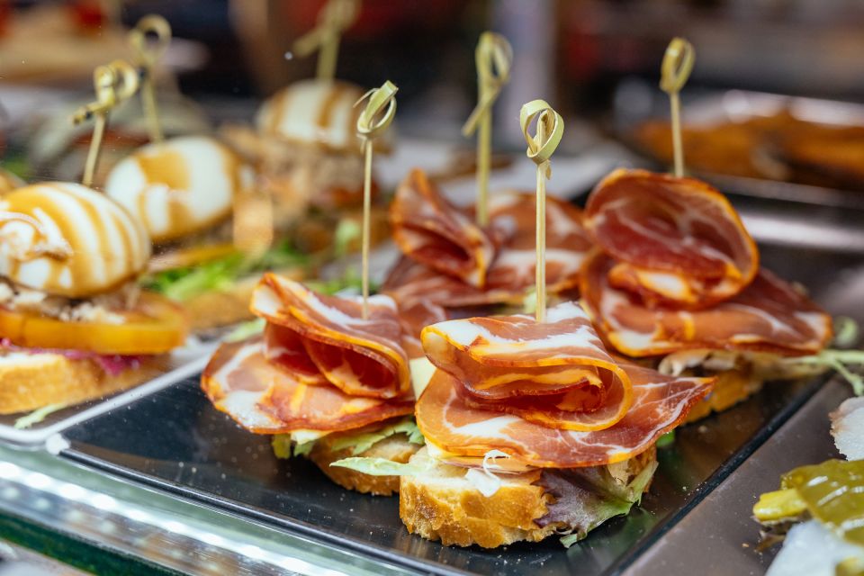 Palma de Mallorca: 10 Tastings Private Food Tour - The tastings: croqueta, coca de pimientos, and the sweet finish