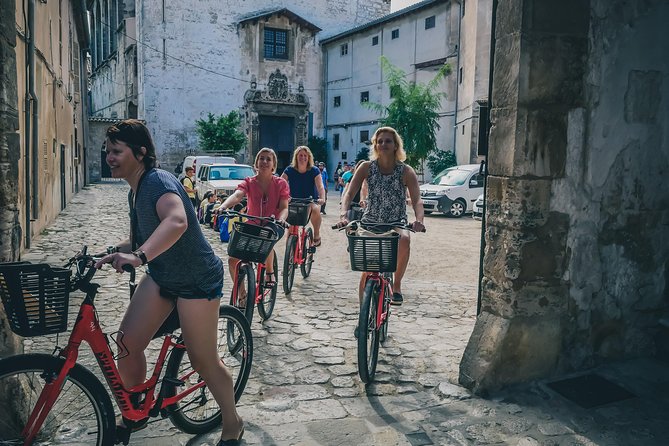 Palma de Mallorca Bike Tour with tapas - The Ride Out: Old Harbor Views and Church Stops That Set the Tone