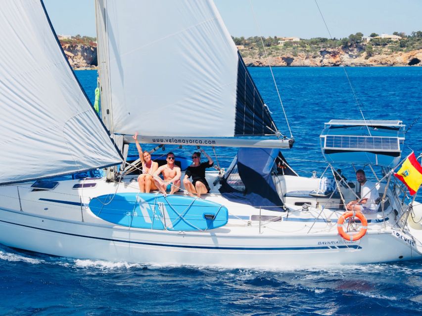 Palma: Private Sailing Boat Excursion with Optional Paella - Secret coves: snorkeling and paddle surfboards in sheltered water