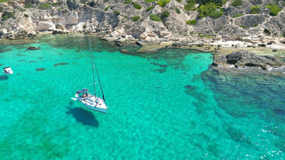 Palma: Private Sailing Boat Excursion with Optional Paella - The food stop: snacks onboard plus a regional tasting moment