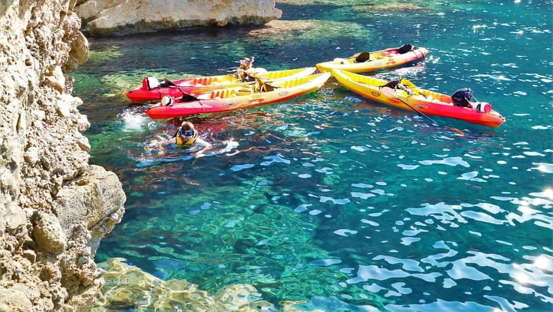 Pollença: Kayak Discovery – Snorkeling and Caves - Rock jumps from the cliffs: optional fun, not a requirement