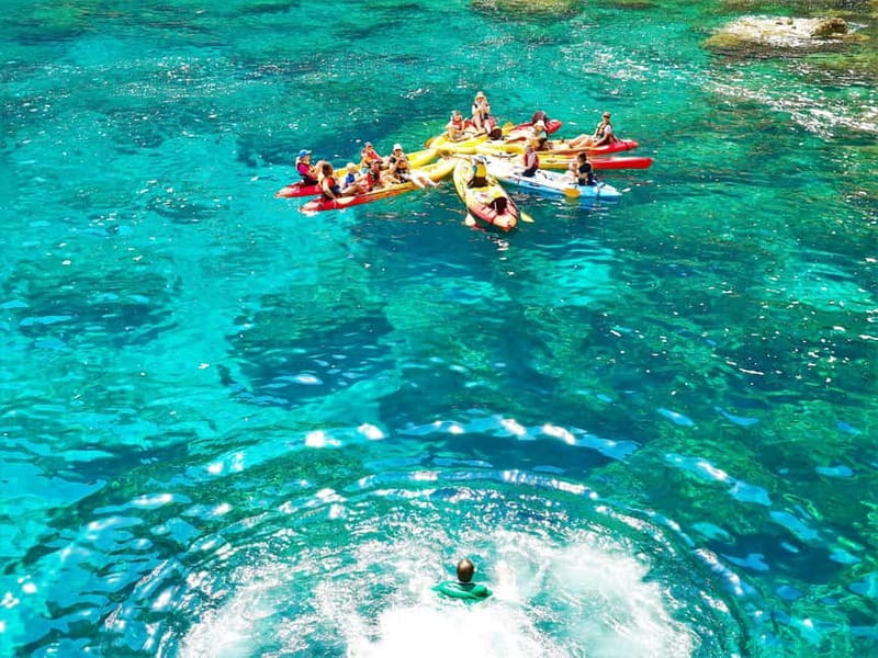 Pollença: Kayak Discovery – Snorkeling and Caves - Kayaking Cala Sant Vicenç: turquoise water, reefs, and serious cliffs