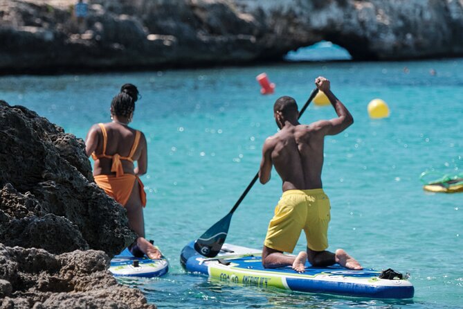Tour Beach Portal Vells, Cave Portal Vells. - Getting picked up: marked vans and a WhatsApp note the night before