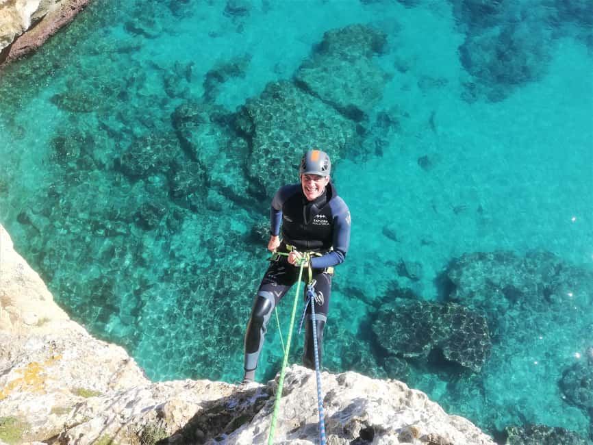 Visit to the Coloms water cave - The 4-hour flow: hike, beach access, 20m rappel, and entrance swim
